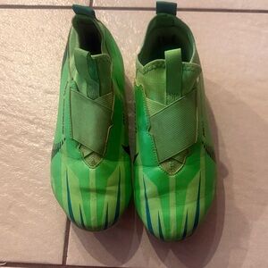 Nike Kids Green Slip-On Soccer Sneakers with Navy Accents